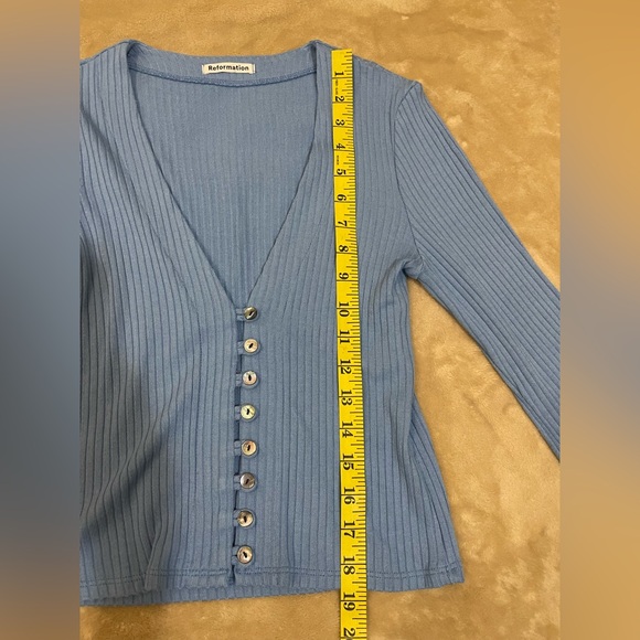 Reformation Gellar Button Front Long
Sleeve Ribbed Knit Top Parisian Blue. - Picture 5 of 15